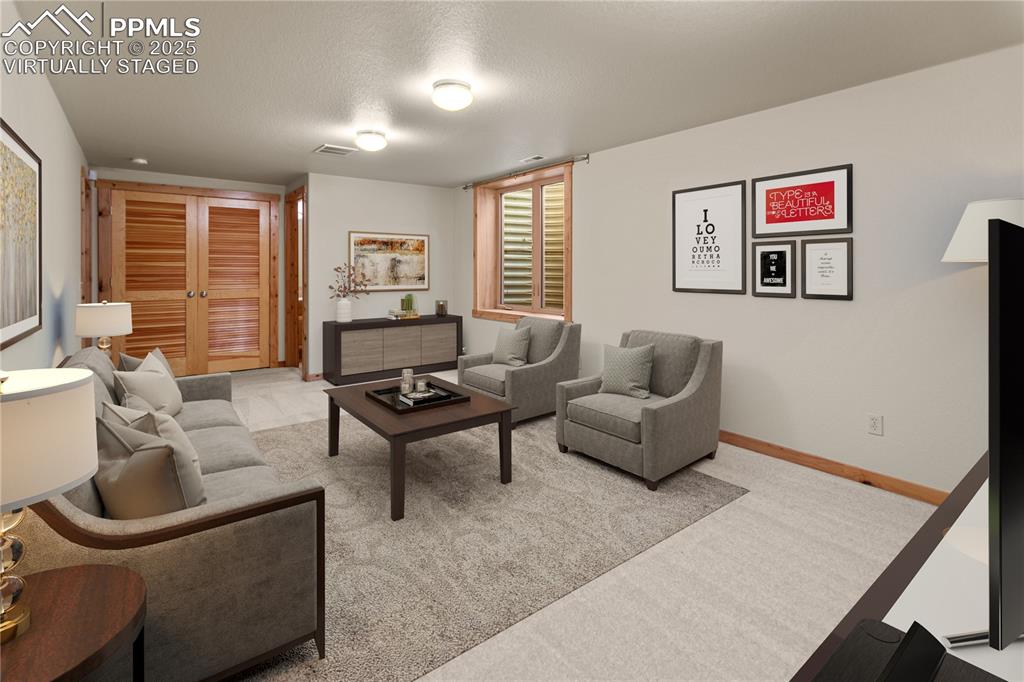 Image 13 of 37: Lower Level Family Room - Virtually Staged