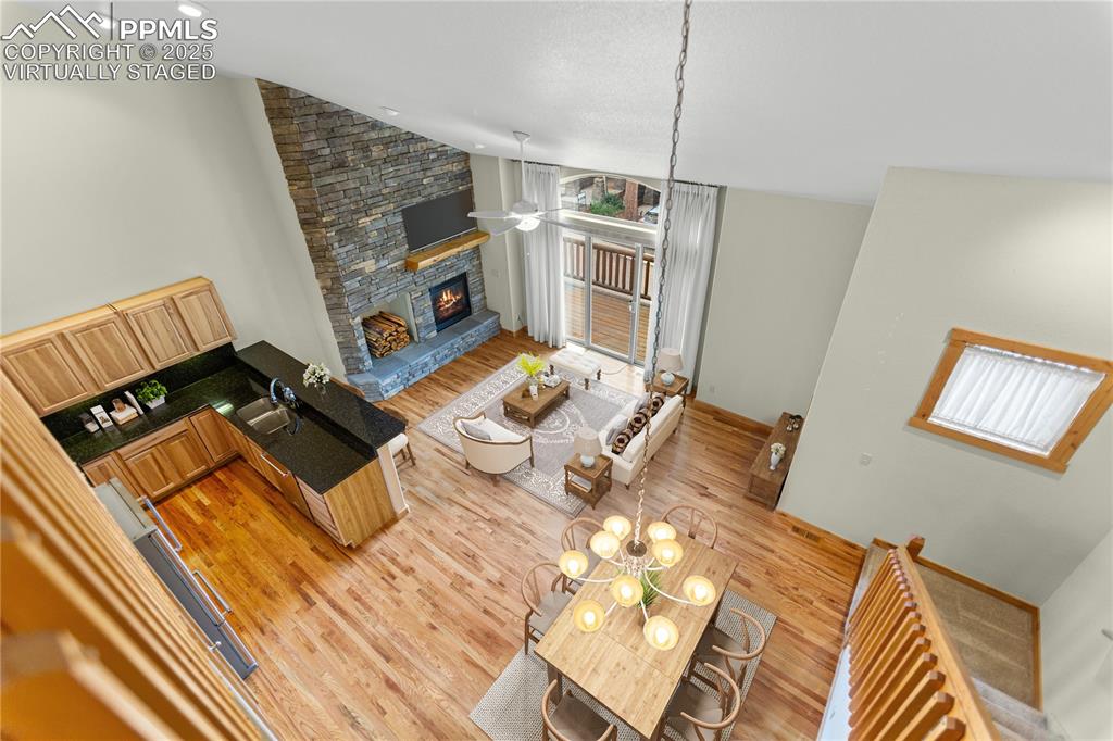 Image 16 of 37: Great Room from Upper Level Balcony - Virtually Staged