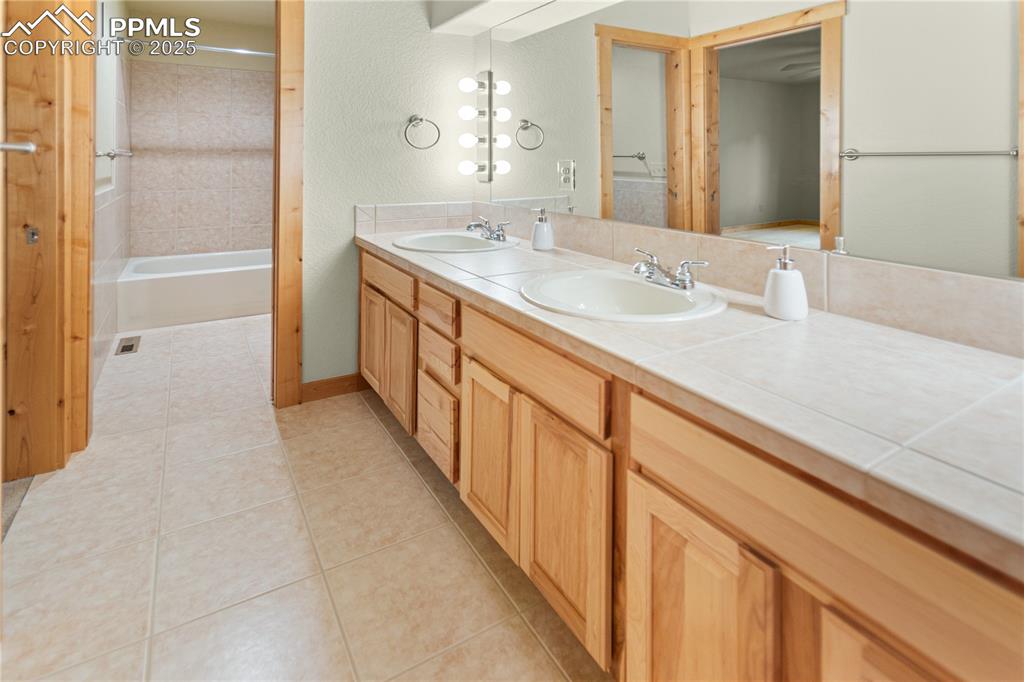Image 20 of 37: Upper Level Bath