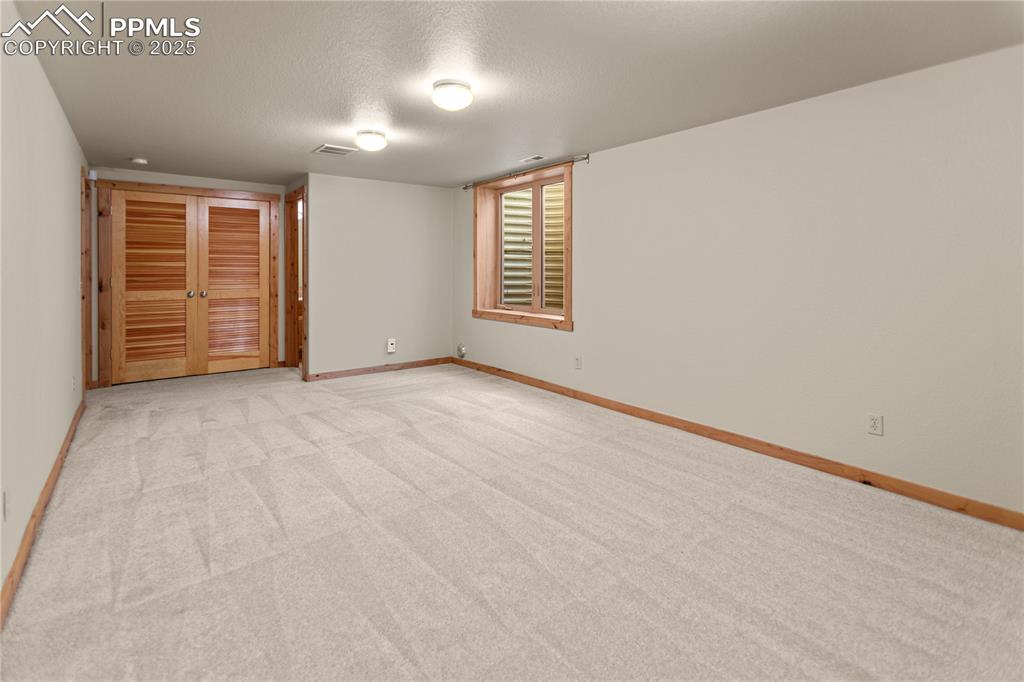 Image 28 of 37: Lower Level Family Room