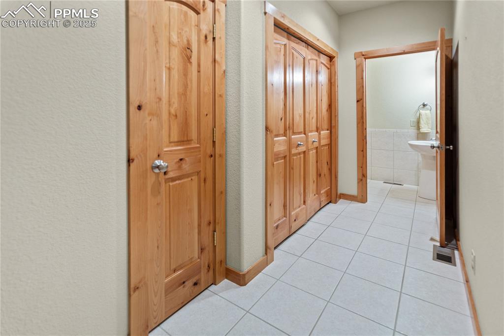 Image 7 of 37: Guest Bath and Laundry area