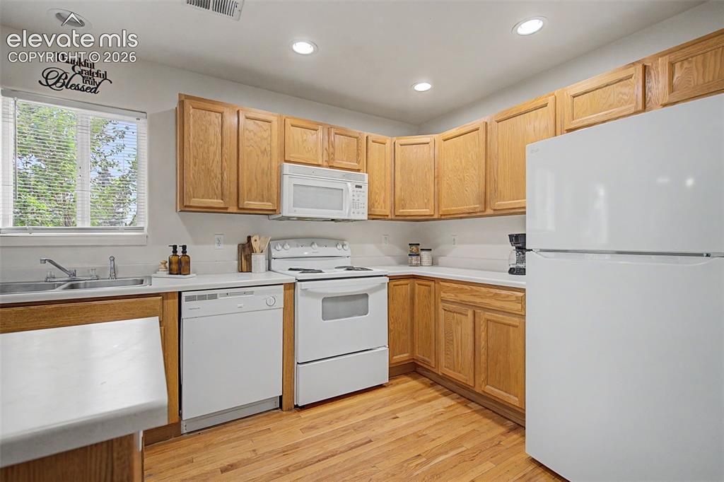 Image 10 of 22: Kitchen with Abundant Cabinetry