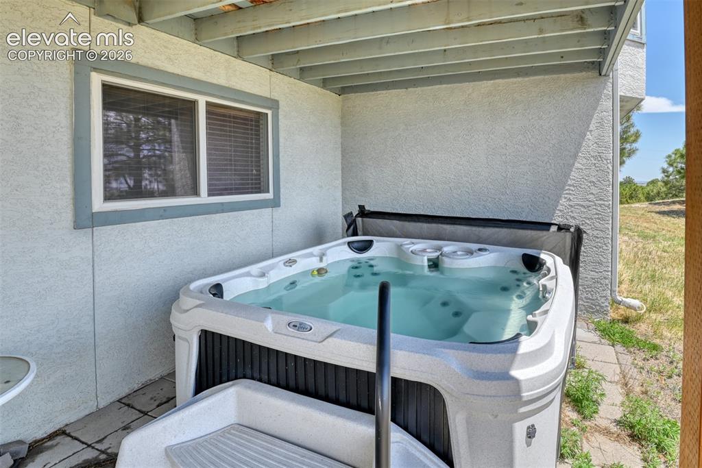 Image 32 of 44: Hot tub stays...it is almost brand new.
