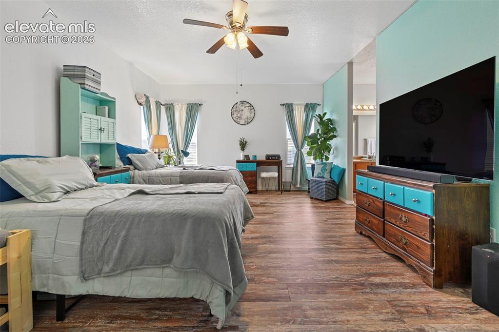 Image 18 of 32: Oversize primary bedroom with vaulted ceiling