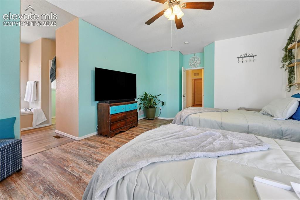 Image 20 of 32: Primary with adjoining ensuite 