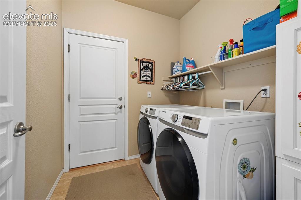 Image 28 of 32: Laundry room conveniently located on main level