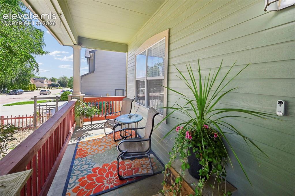 Image 3 of 32: Large covered front porch
