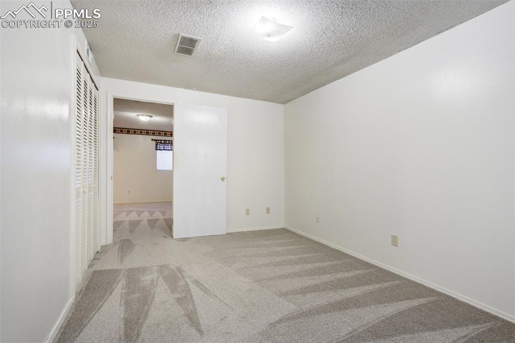 Image 32 of 40: Bedroom