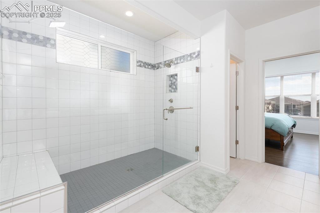 Image 13 of 40: Large walk-in shower with two shower heads