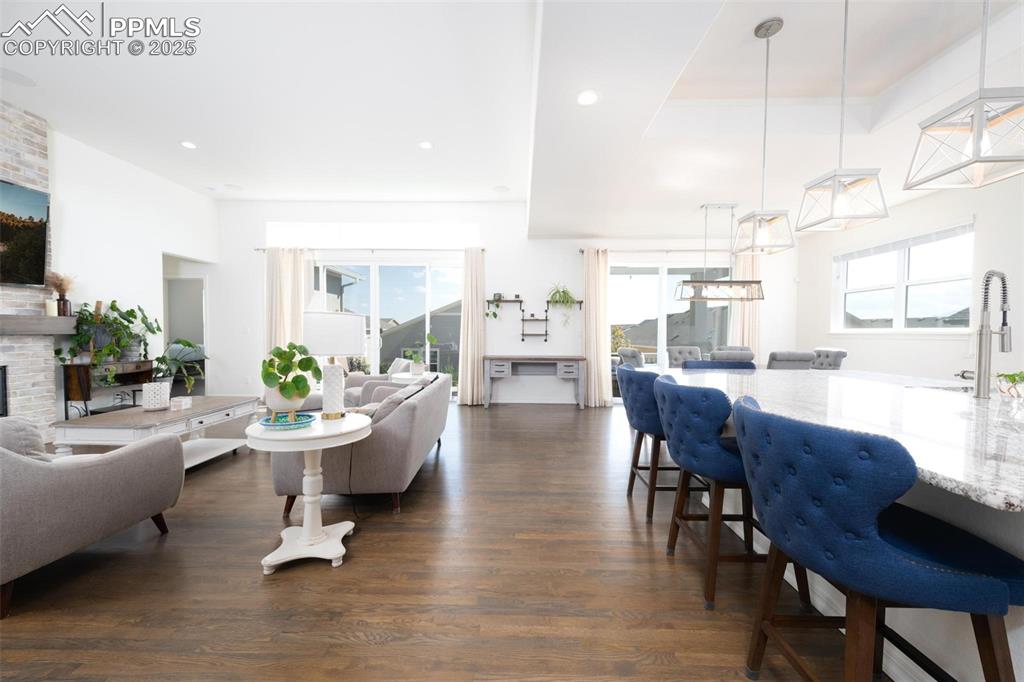 Image 3 of 40: Great Room with view of both sets of sliding glass doors