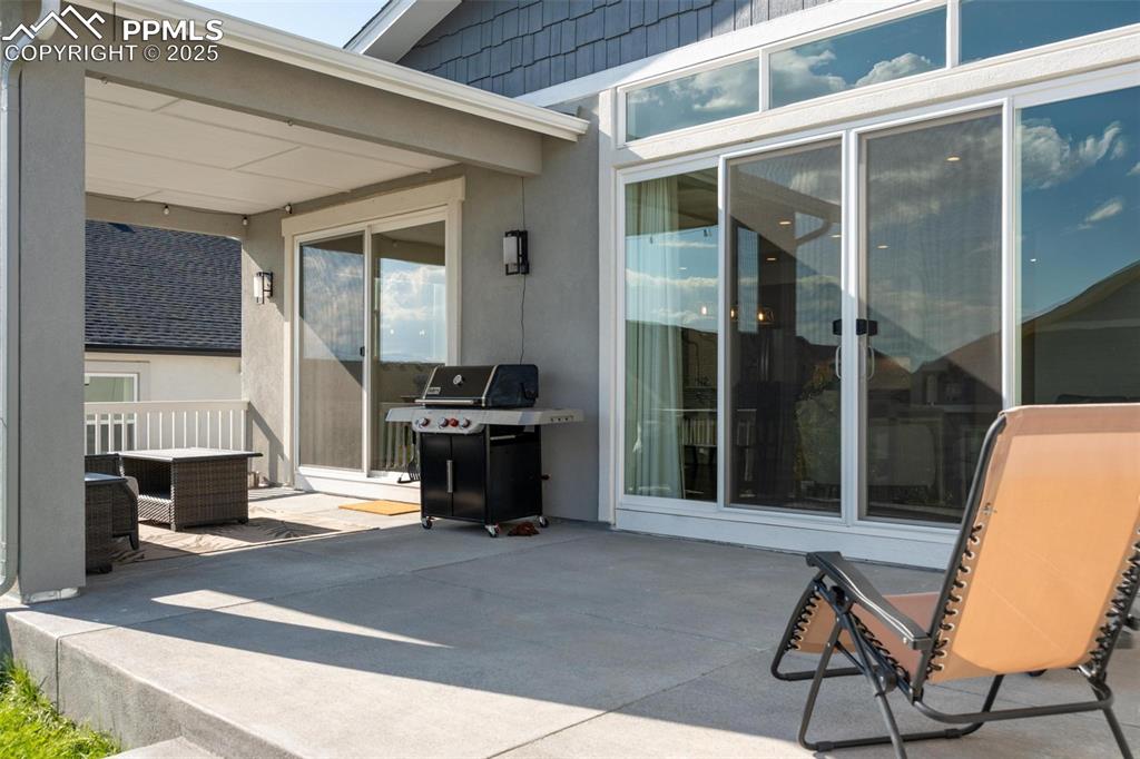 Image 32 of 40: Covered patio off of the dining room