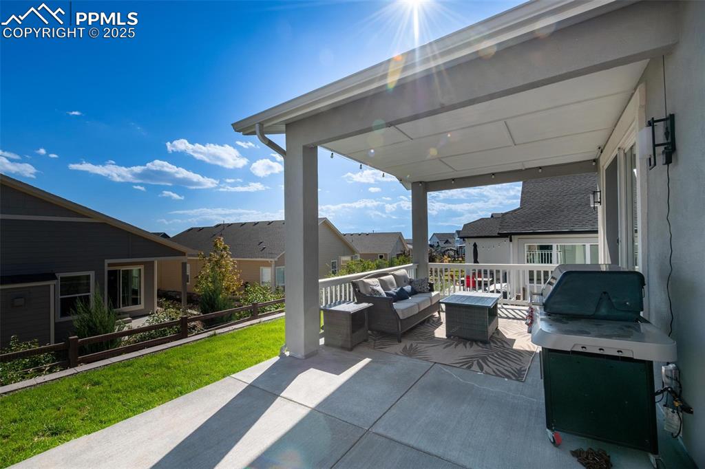 Image 34 of 40: Covered patio off of the dining room