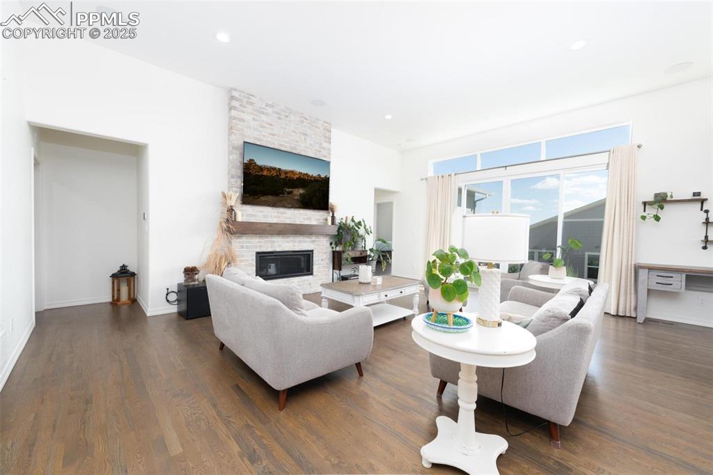 Image 8 of 40: Great room with double sliding glass doors