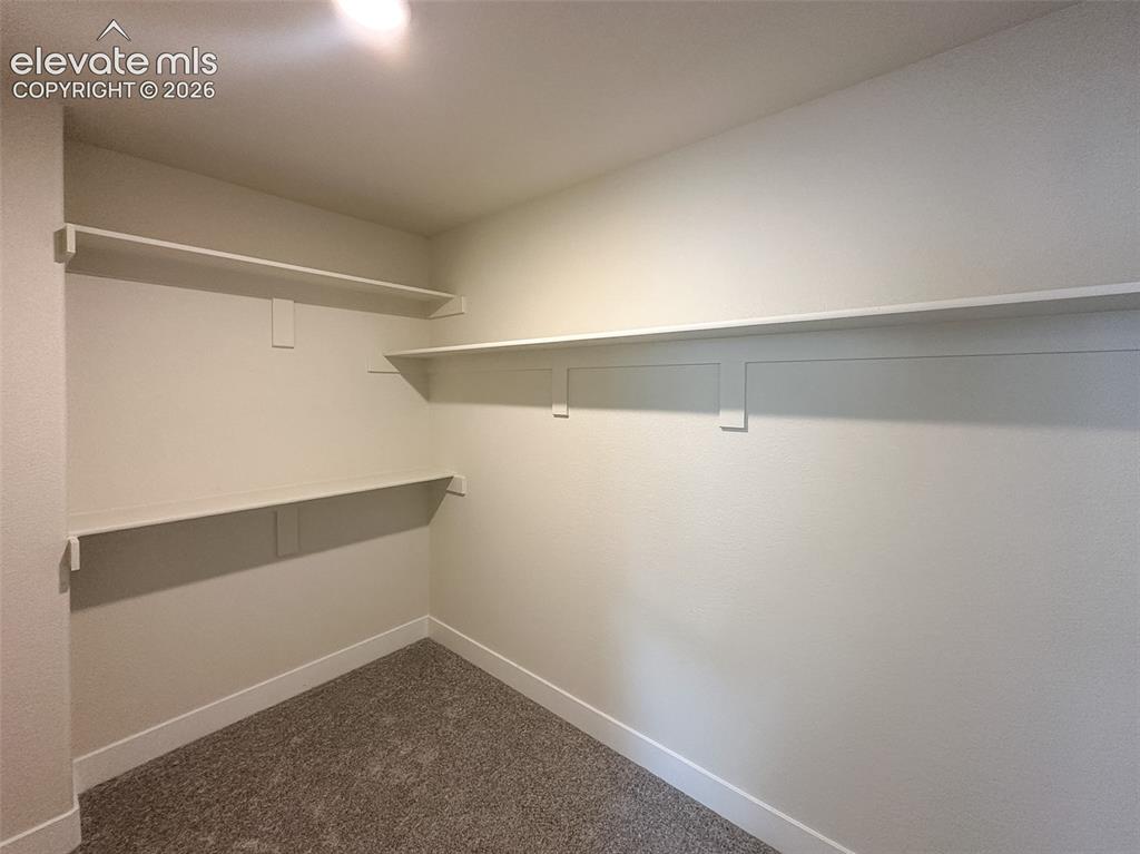 Image 23 of 41: Dual primary closets
