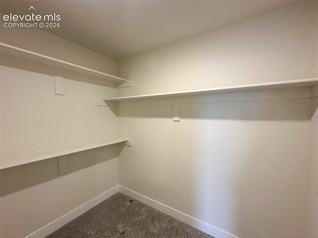 Image 24 of 41: Dual primary closets