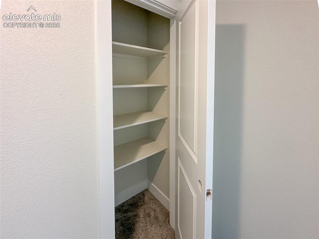 Image 26 of 41: Closet