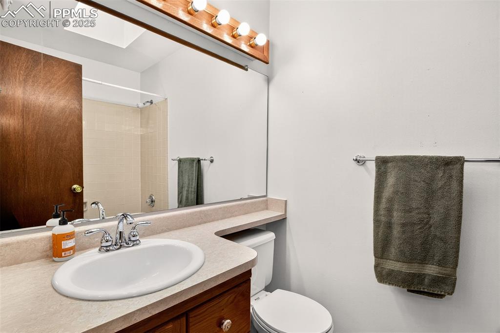 Image 27 of 50: Upper level Full Bath is across hall from 2nd Bedroom