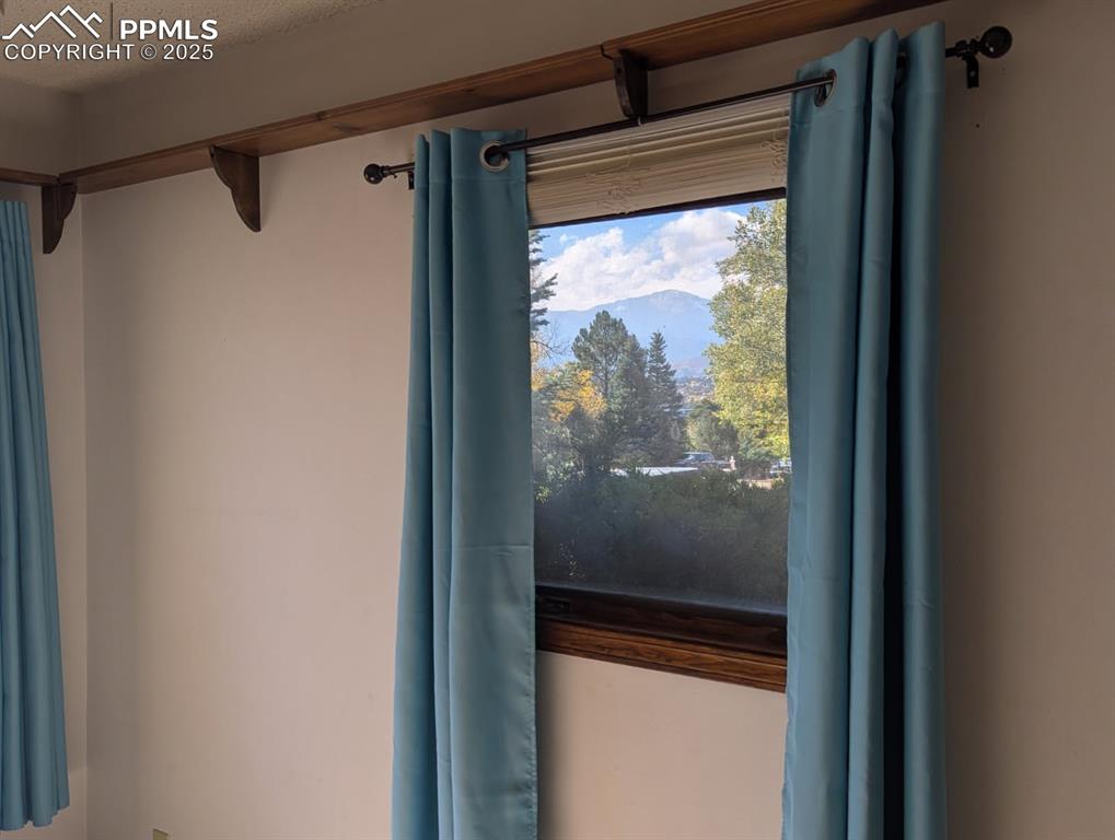 Image 34 of 50: Mountain views out of 3rd Bedroom/Office window