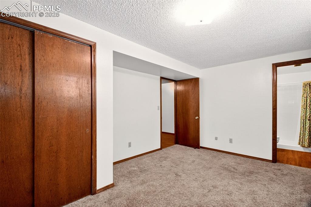 Image 36 of 50: Basement 4th Bedroom has adjoining 3/4 Bathroom