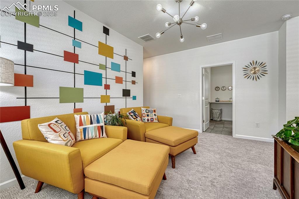 Image 21 of 50: Across from the loft is the laundry room with electric hookups