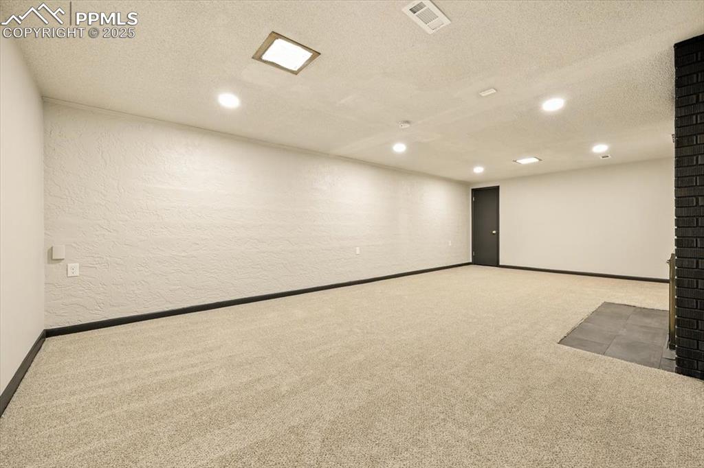 Image 25 of 35: HUGE Basement Rec room