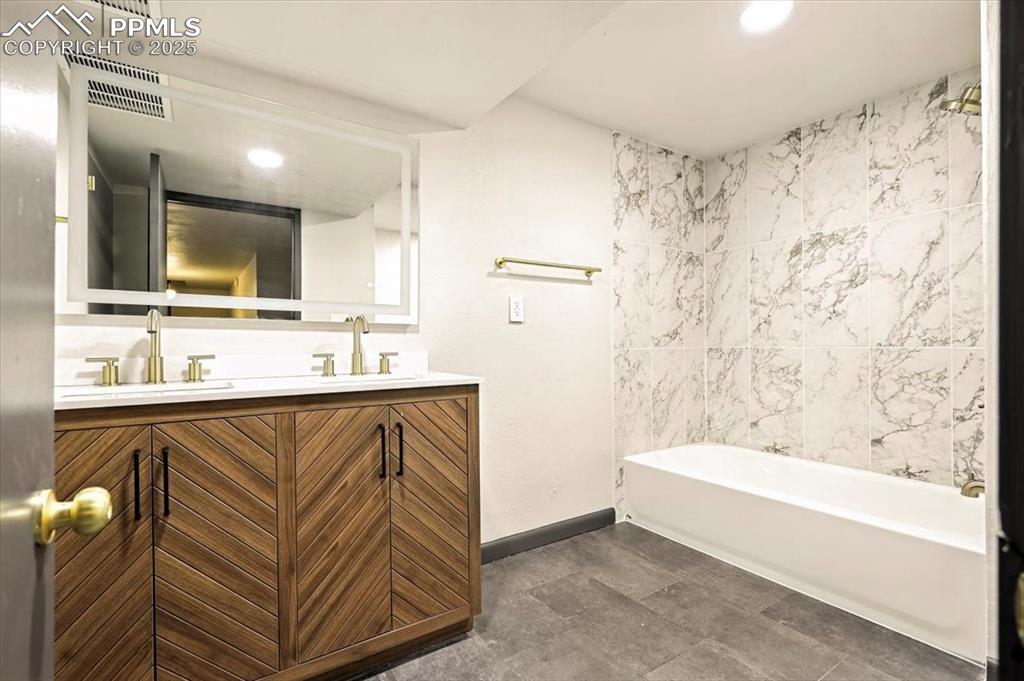 Image 26 of 35: Basement Bathroom