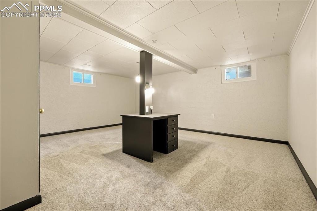 Image 30 of 35: HUGE basement bedroom/craft room/guest suite. 2 closets.