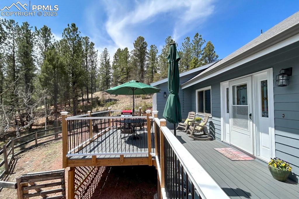 Image 29 of 50: View of wooden deck