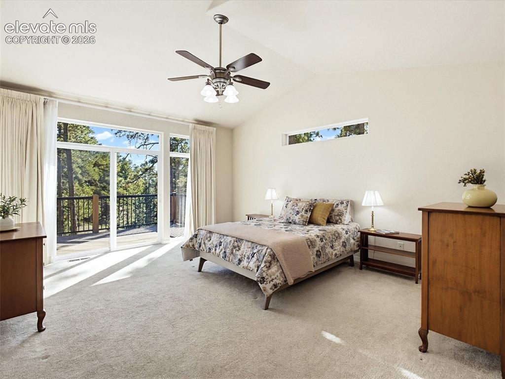Image 18 of 48: Primary Suite with walk-out to deck & views