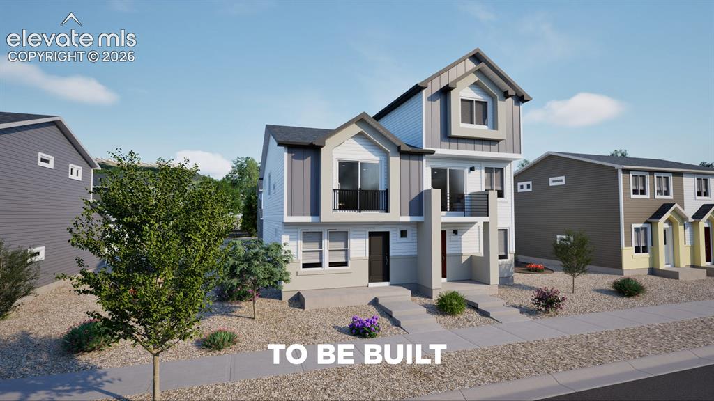 Image 1 of 26: Multi-level facade with a pitched roofline and dormer window