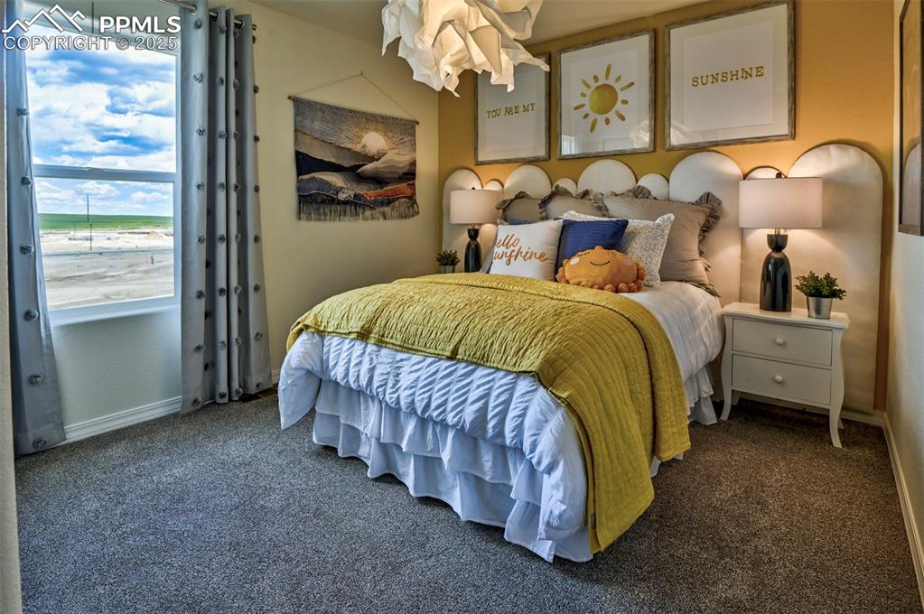 Image 10 of 35: Bedroom featuring carpet floors and a water view