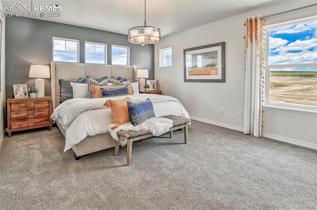 Image 5 of 35: Bedroom featuring carpet floors and baseboards