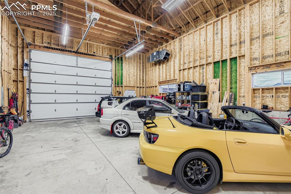 Image 25 of 28: Detached 40ft X 30ft X 28ft RV Garage with 220 Volt Power.