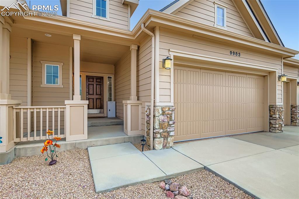 Image 4 of 28: View of exterior entry with covered porch