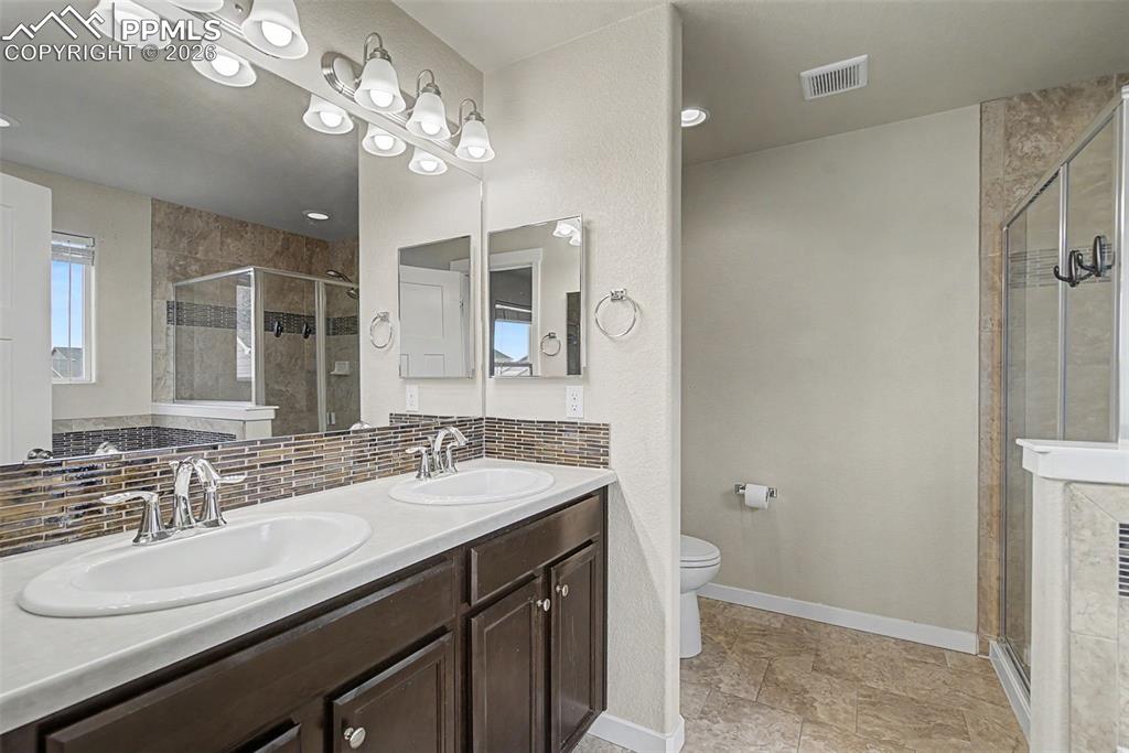 Image 14 of 30: Master Bathroom
