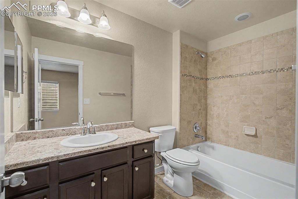 Image 22 of 30: Basement Bathroom