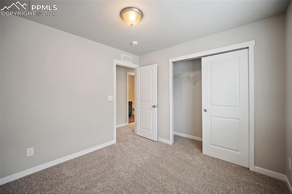 Image 24 of 34: Bedroom