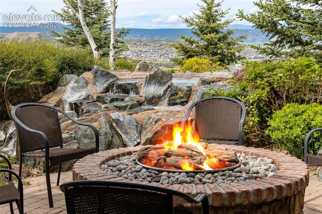 Image 6 of 50: Gas Firepit, walkways, patios along with impressive water features