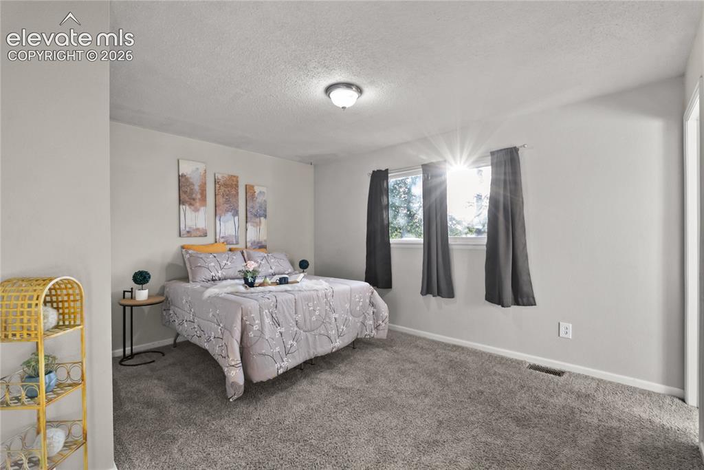 Image 14 of 36: Bedroom