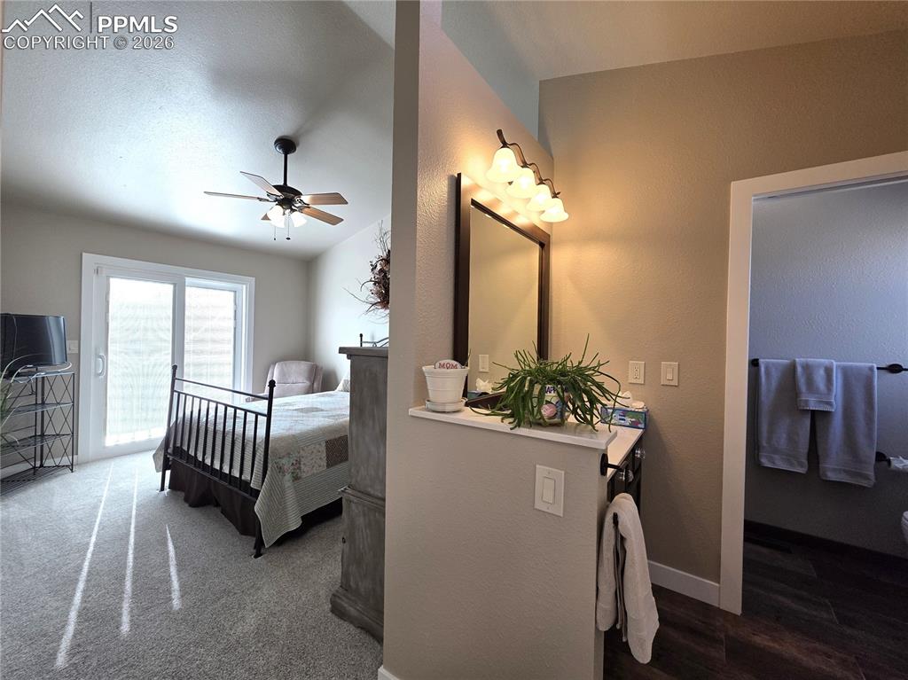 Image 27 of 35: With 3/4 bath in hallway