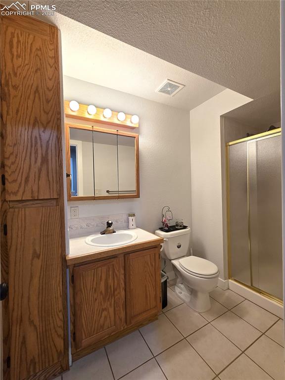 Image 32 of 35: Basement 3/4 bath