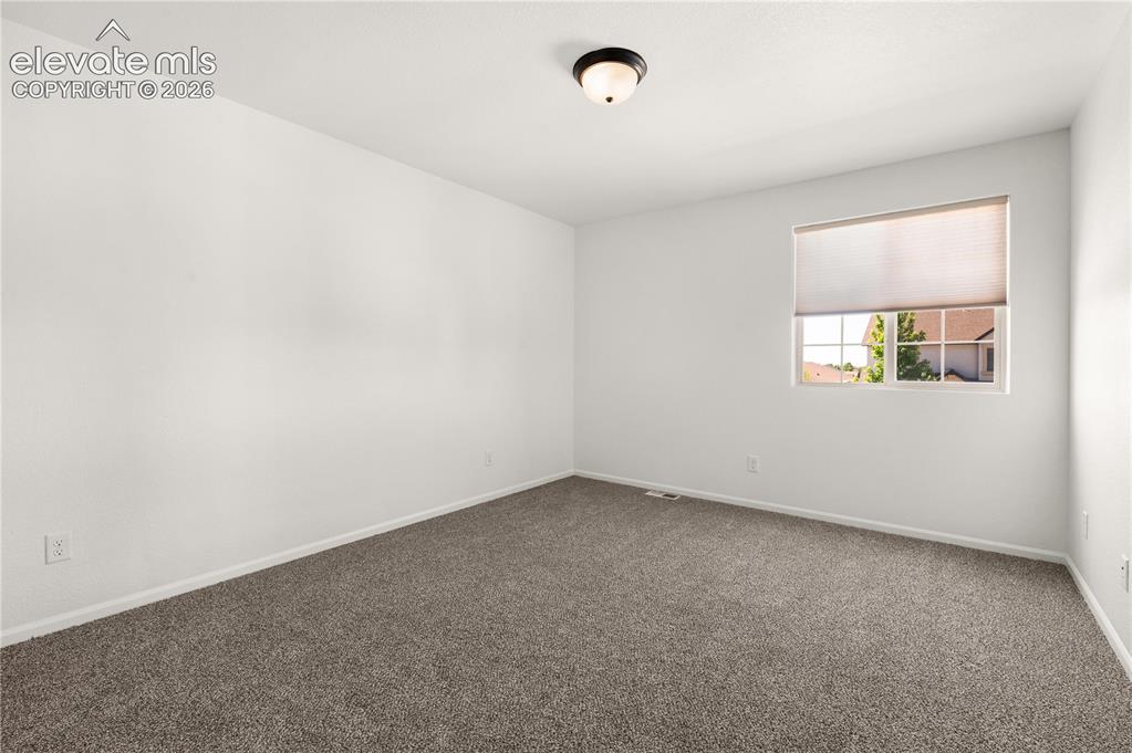 Image 25 of 29: Bedroom