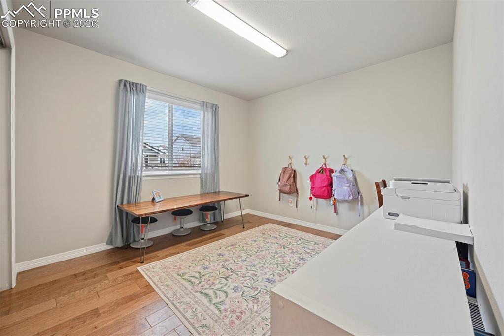 Image 20 of 41: main level secondary bedroom