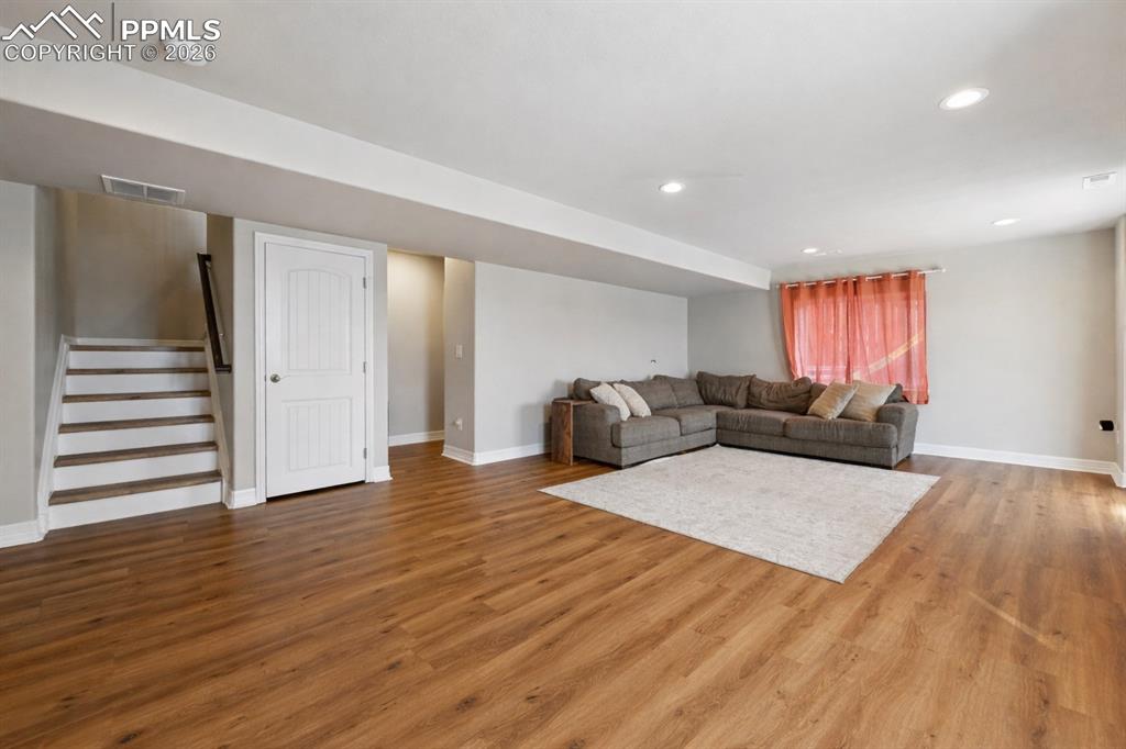 Image 24 of 41: basement family room