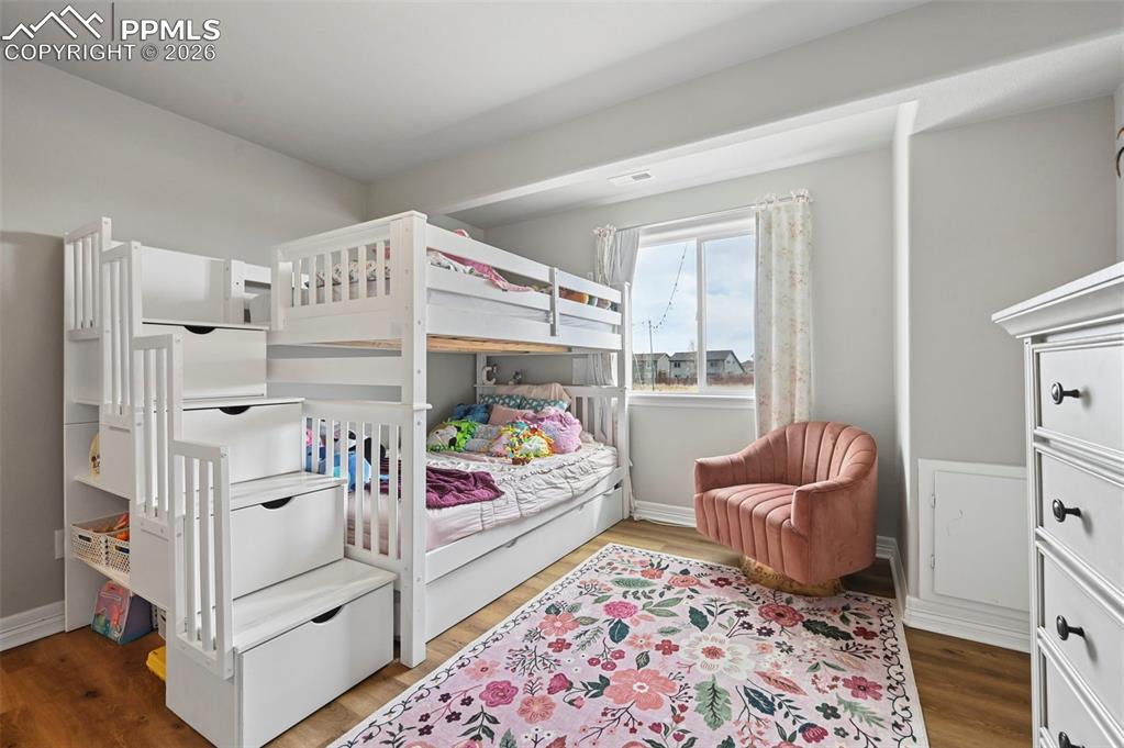 Image 26 of 41: basement bedroom
