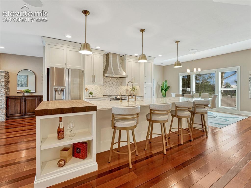 Image 14 of 42: A stunning kitchen made for gathering