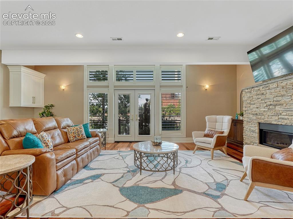 Image 18 of 42: Dramatic windows, natural light & warmth