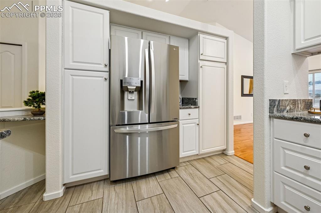 Image 14 of 37: Upgraded stainless fridge and 2 pantry units!