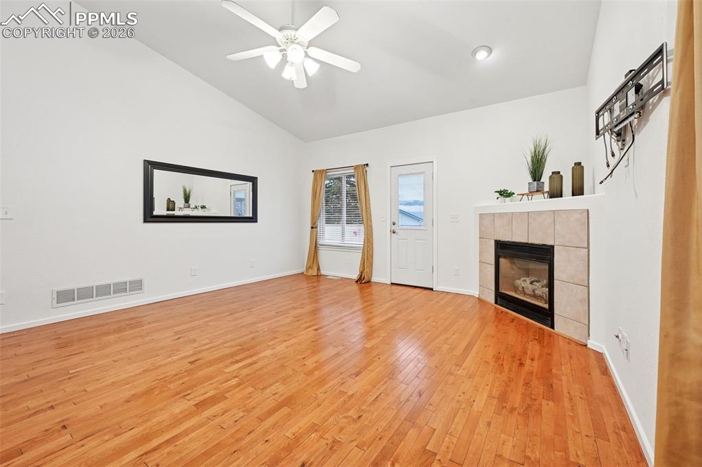 Image 17 of 37: Vaulted ceilings and fireplace