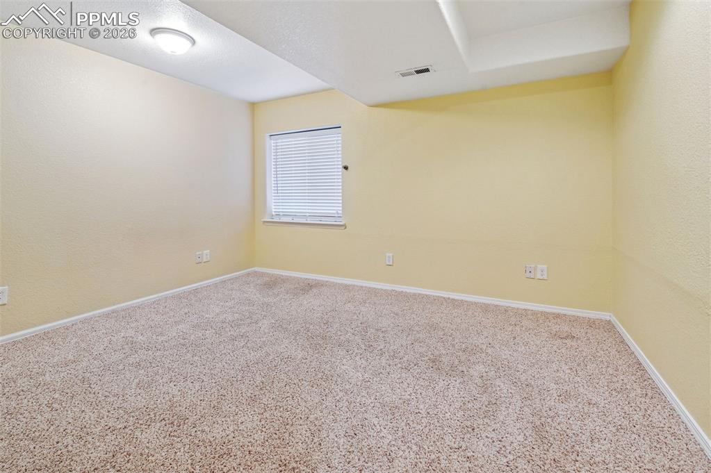 Image 32 of 37: 3rd bedroom in basement